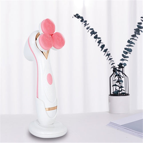 White and pink facial cleansing brush on a white background with decorative elements.