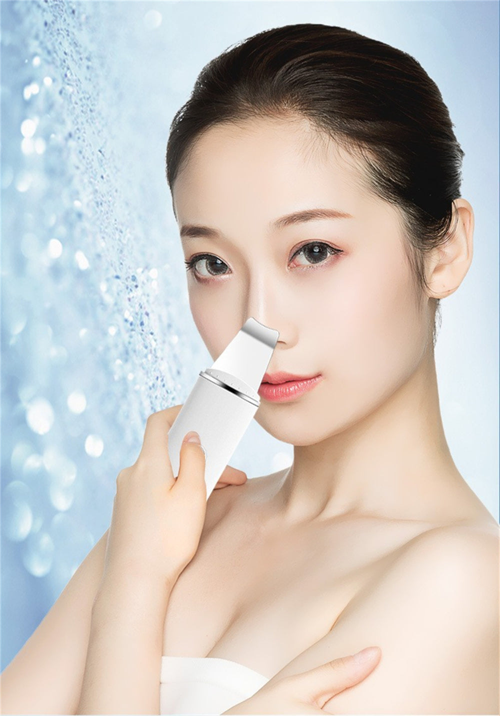 Woman using a skincare device with a blue gradient background