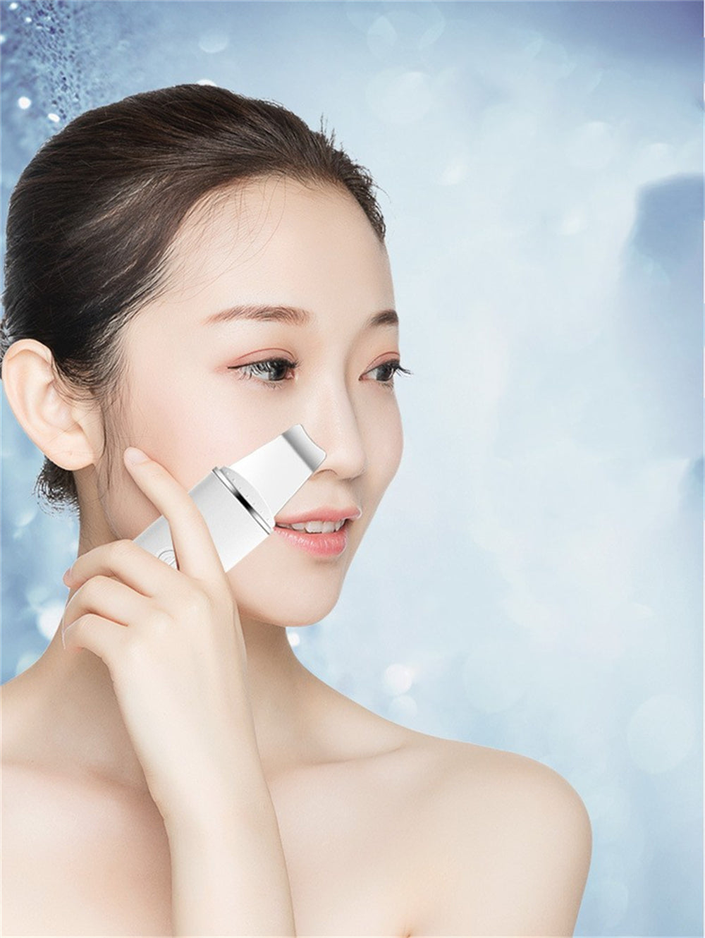Woman using a skincare tool on her face against a blue gradient background